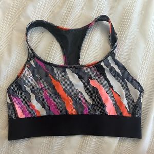 Pink, orange, and grey sports bra by Victoria Sport